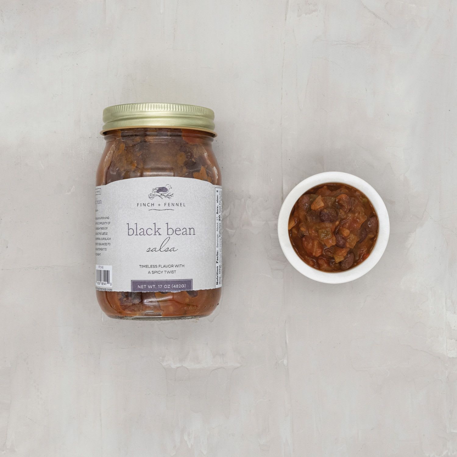 Finch + Fennel 17 oz. Black Bean Salsa - Our Black Bean Salsa is rich and tangy. It is perfectly balanced to add depth and excitement to any taco night!