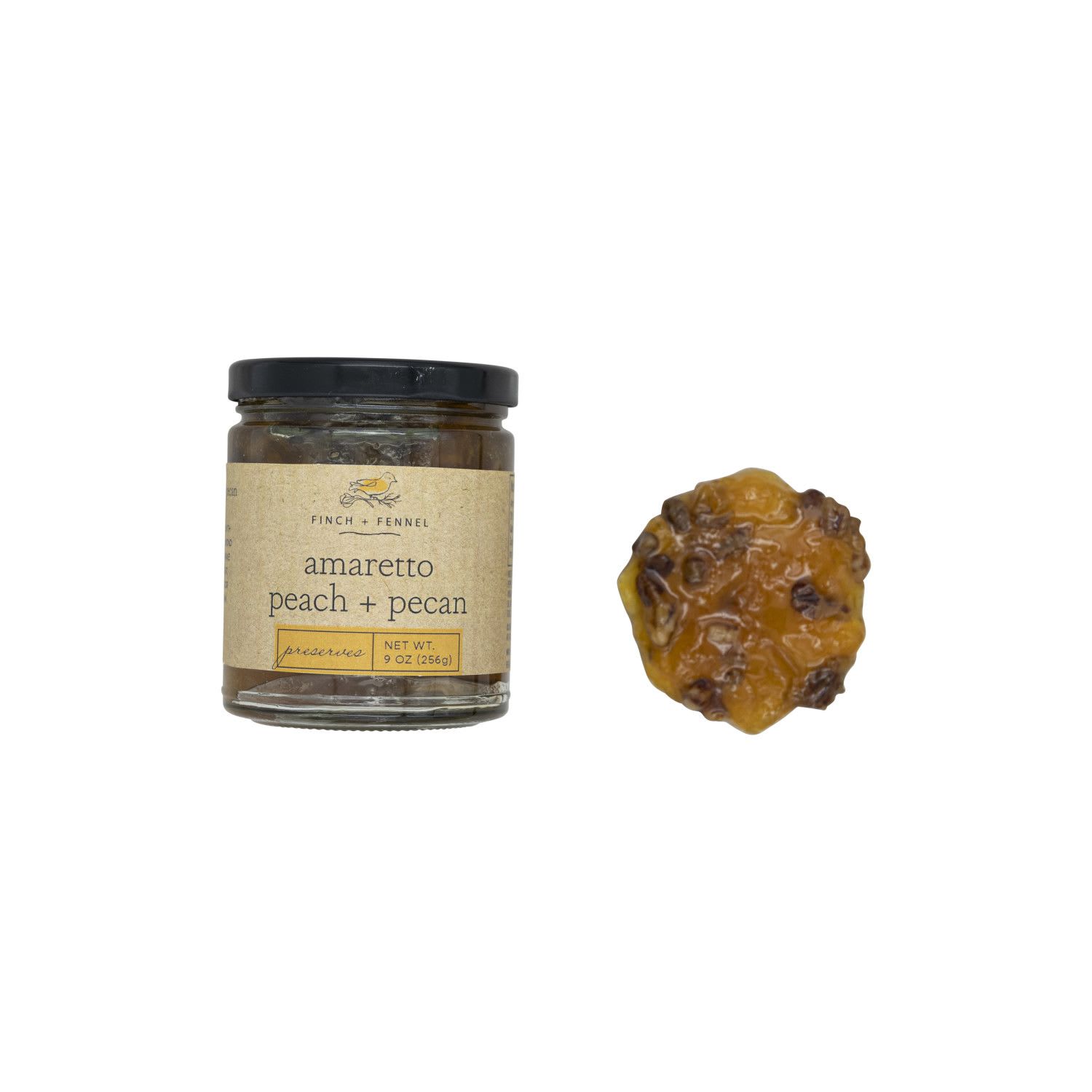 Finch + Fennel Amaretto Peach + Pecan Preserves - Sweet peaches, mixed with the subtle taste of almonds and crunchy pecans make for an unexpected treat in Amaretto Peach + Pecan Preserves. Try warming it for an ice cream topping.