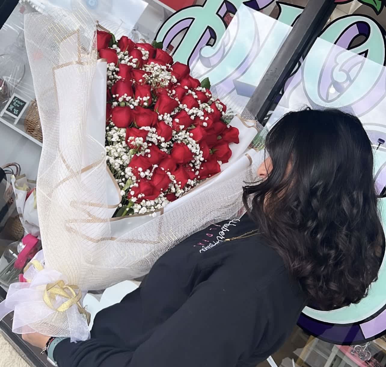 Laid Roses - 25 red roses laid down with baby's breath and greenery.  ~You are able to request rose colors in 'notes for florist/special instructions' at checkout and we will do our best to accommodate.~