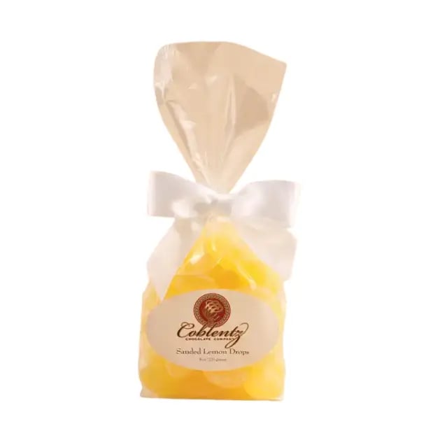 Bag of sanded lemon drops tied with a white ribbon