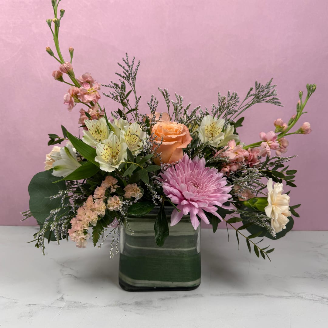 Soft &amp; Sentimental Cube - Our Soft &amp; Sentimental Cube features a gentle blend of blush, ivory, and soft pastel blooms, designed to feel romantic, elegant, and timeless.  Each arrangement is created using the freshest flowers we have in-store, allowing our designers to hand-select the most beautiful stems of the day while staying true to this soft and delicate color palette.  No two arrangements are exactly alike, making every piece uniquely special while maintaining the same overall look and feel.  Available in three sizes. For a fuller, more luxurious look, we recommend upgrading to our Deluxe or Premium designs.  Standard Size approx. L 17" x H 14", but will vary with each design.
