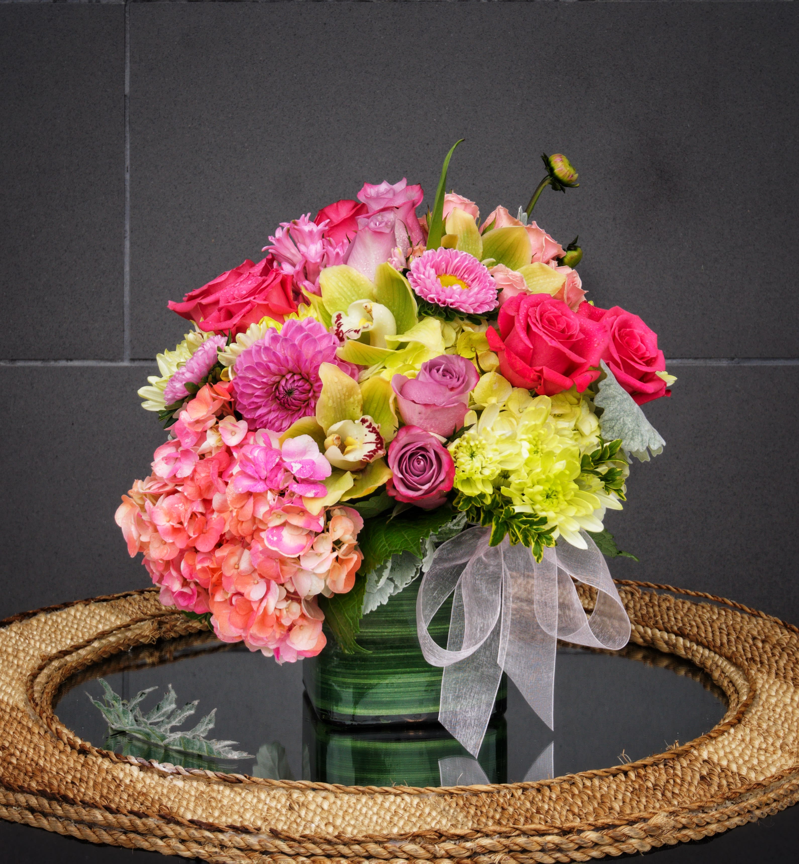 French Style - A beautiful design including all premium seasonal fresh flowers: orchid, rose, fragrant stock, hydrangea... STANDARD: FIRST PHOTO DELUXE: SECOND PHOTO