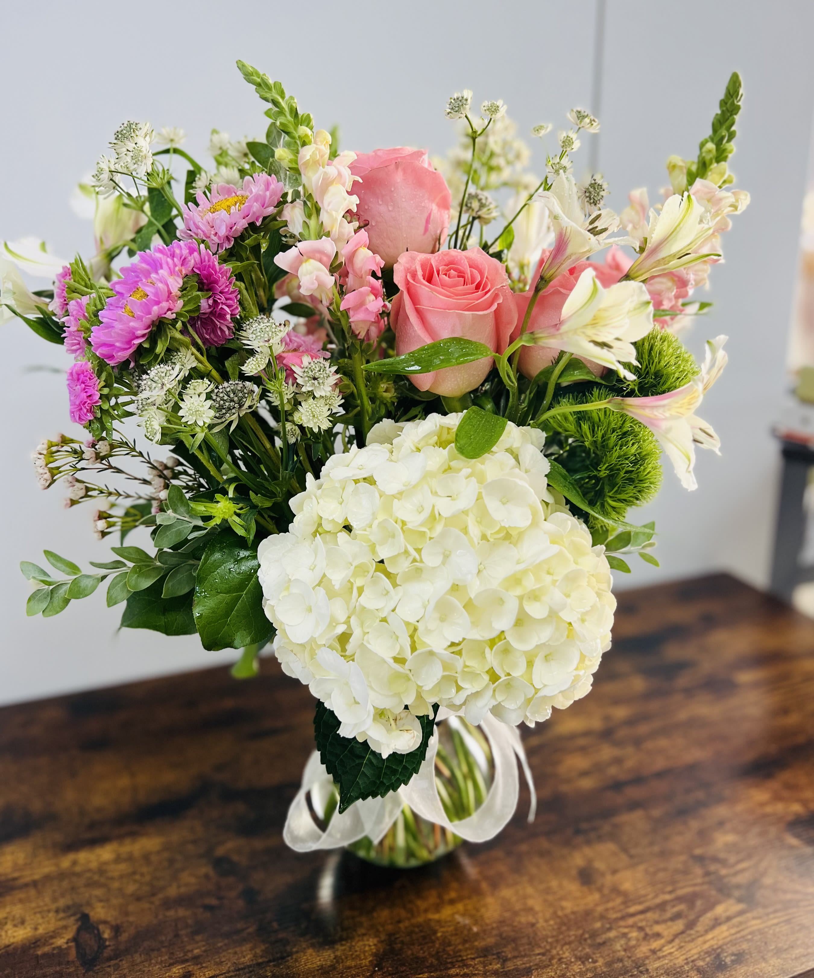 My Dear - A pretty design including fragrant stock, rose, hydrangea, alstroemeria and accents.