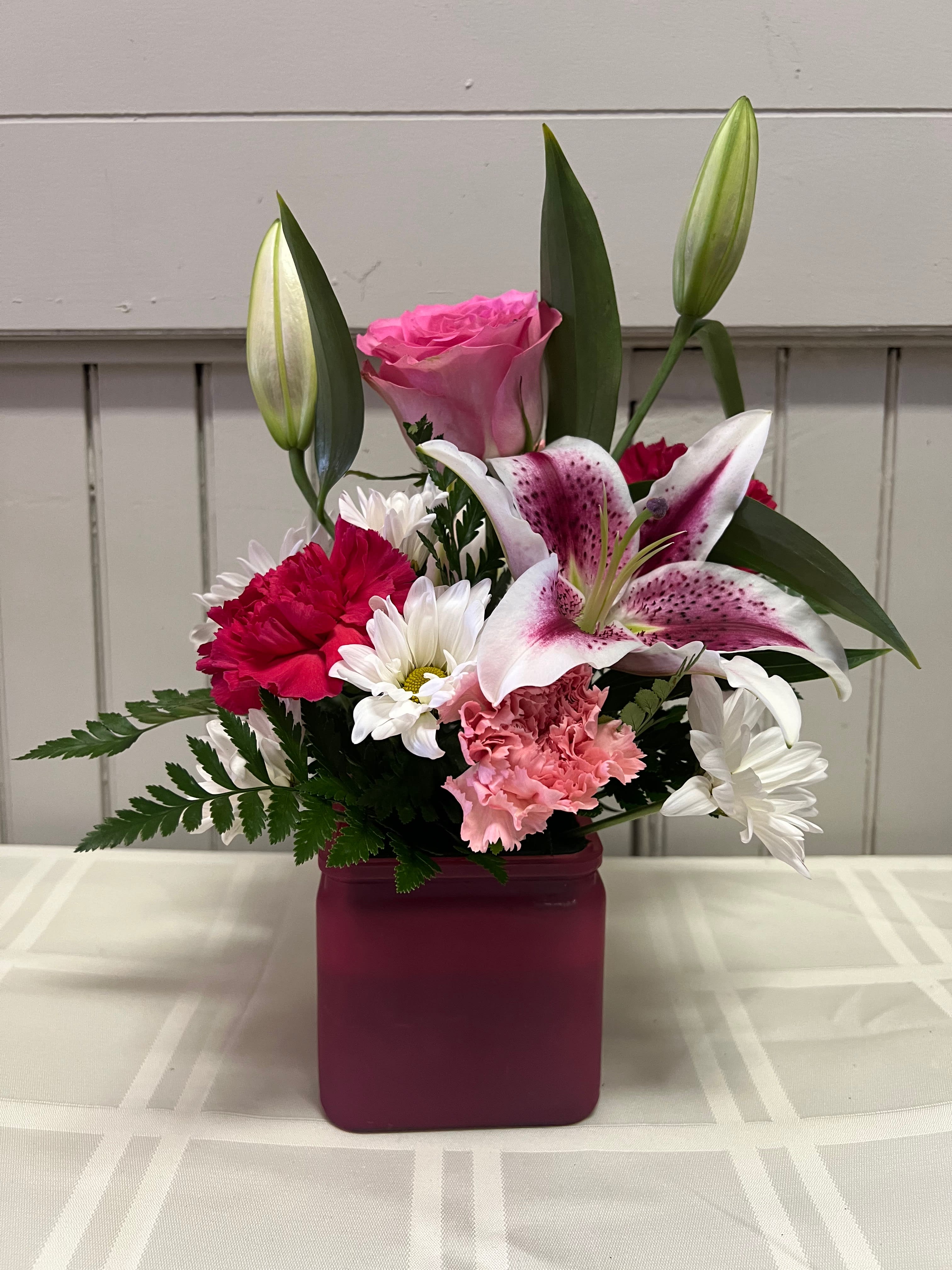 Pink Lilly Celebration  - This arrangements of pink and white is sure to put a smile on someones face! It is guaranteed to smell and look beautiful! 