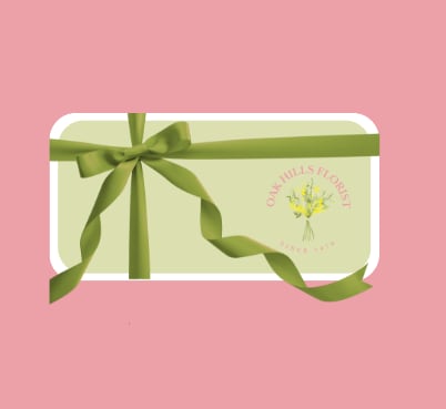 Gift card with a green ribbon bow on a pink background