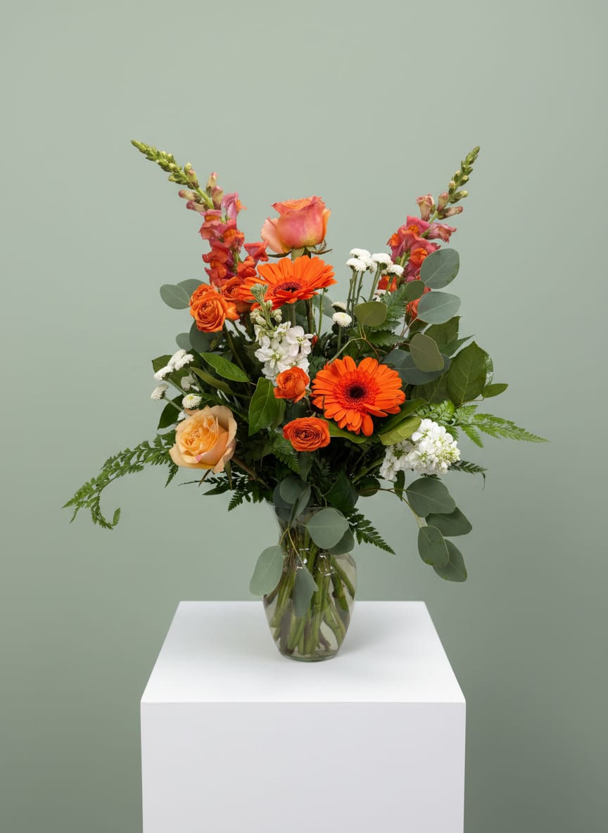Mom's Favorite - Designed for a vibrant, colorful moms- be the favorite child this year by sending her a lush orange bouquet.