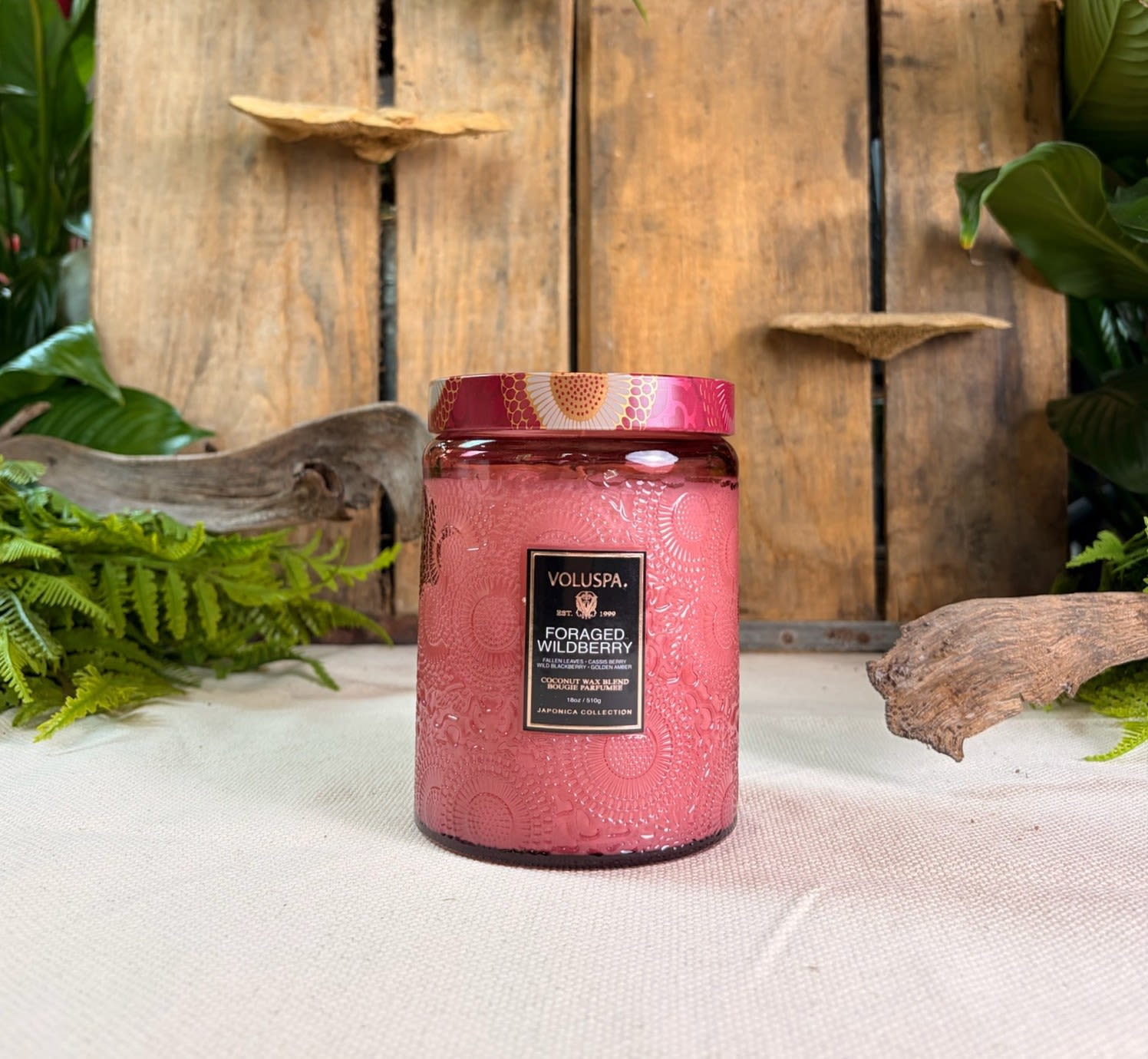 Voluspa Foraged Wildberry Glass Jar Candle 18 oz - Voluspa Foraged Wildberry Glass Jar Candle 18 oz  Fragrance Notes: Capture the moment when the Golden Amber sunlight reaches down through the trees, casting warmth along the edges of a wooded trail. Tread softly on Fallen Leaves as you uncover a tangled maze of plump, ripe Berries. 