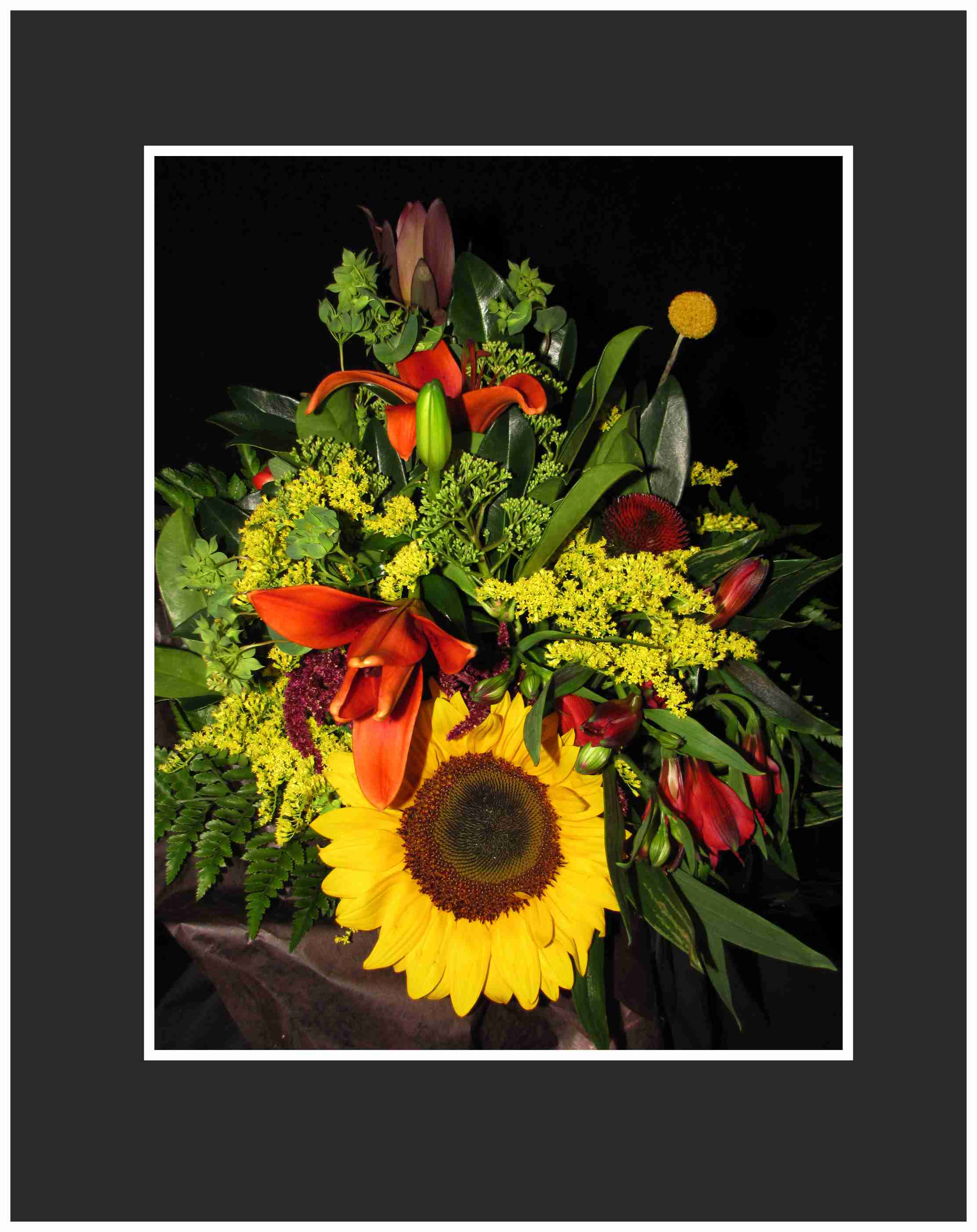 Fall Garden Hand Tied Bouquet - Let our staff build you a wonderful hand tied bouquet that we are famous for! Designed in the hand ready for your vase simply cut the stems.  We will use seasonal flowers in keeping with a fall theme