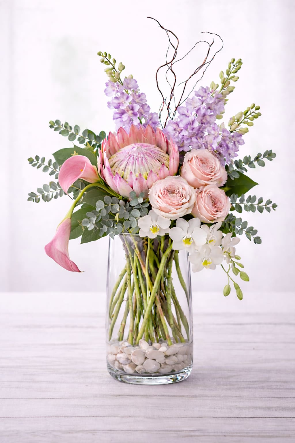 The Grand Bloom - For everything she is. A premium arrangement with high-end blooms designed to impress. 