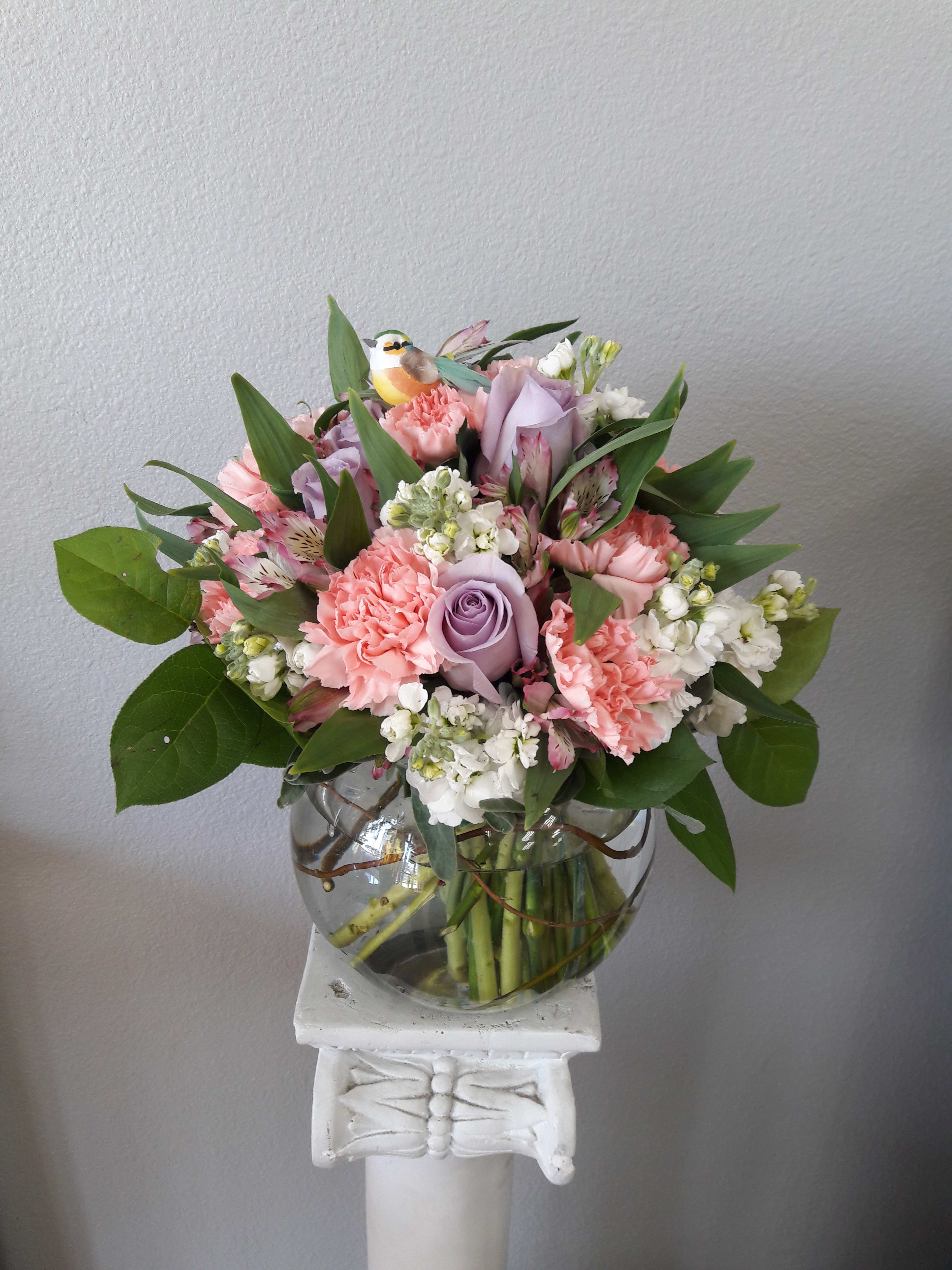  Perfection - This soft display of pink carnations, alstromeria, and purple roses with a touch of white stock is a delicate way to send flowers for an illness, thank you, baby girl congratulations or just because.