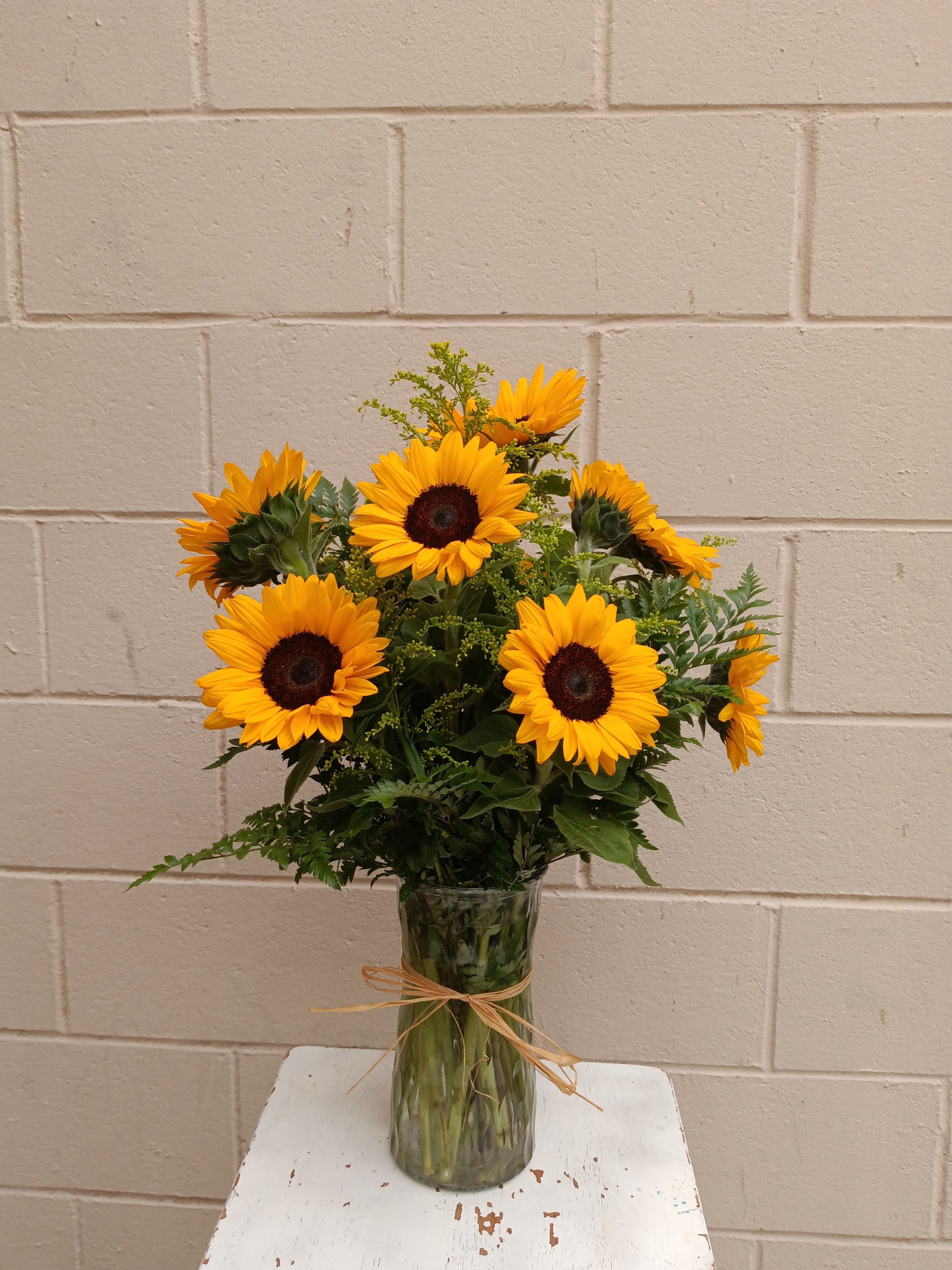 My Sunshine  - Nothing lights up a room like the golden glow of sunny sunflowers, gathered up and presented in a big bouquet. Send this generous bunch to a special friend, and you’ll be sure to receive a cheerful thank you in return!