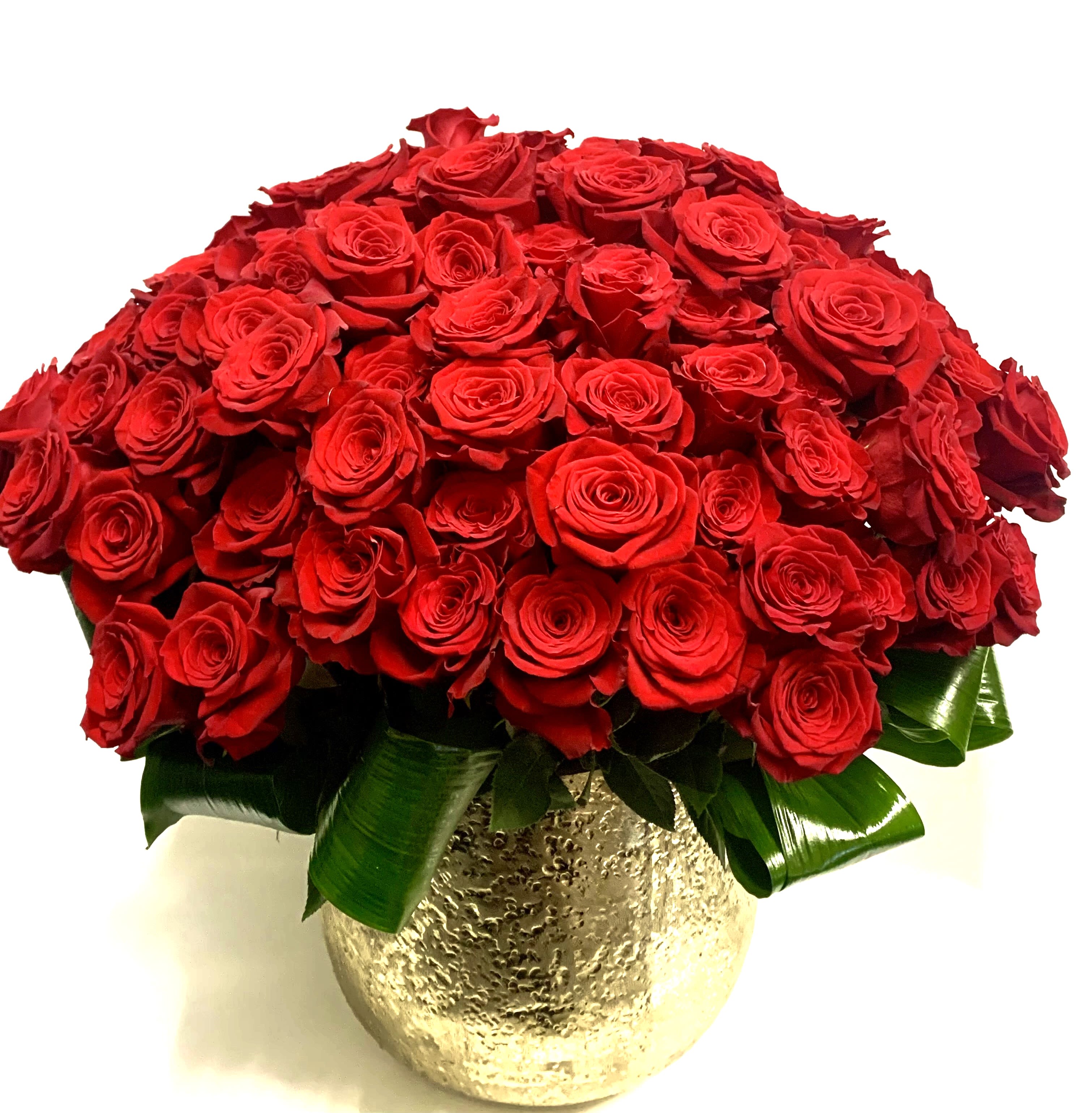 Red rose bouquet in a gold textured vase