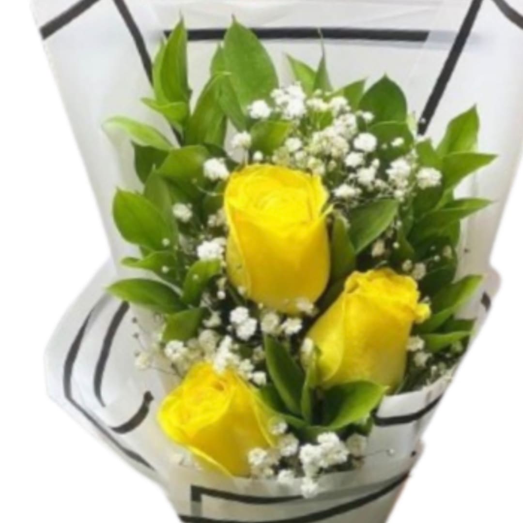 Bouquet of yellow roses with white baby's breath in white wrap