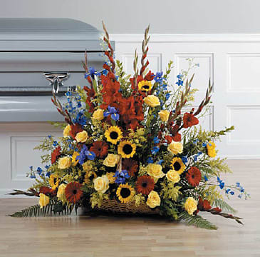 Triadic Fireside Basket in Red, Yellow and Blue - Gerber Daisies, gladiola Iris, Delphinium, roses sunflowers and solidago