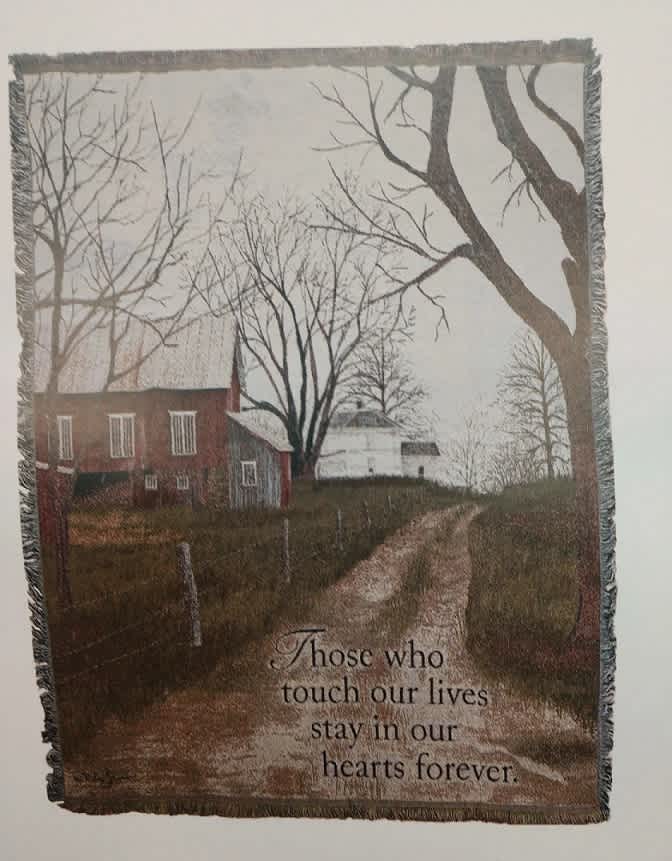 Fringed memorial throw with a farmhouse scene and sympathy quote
