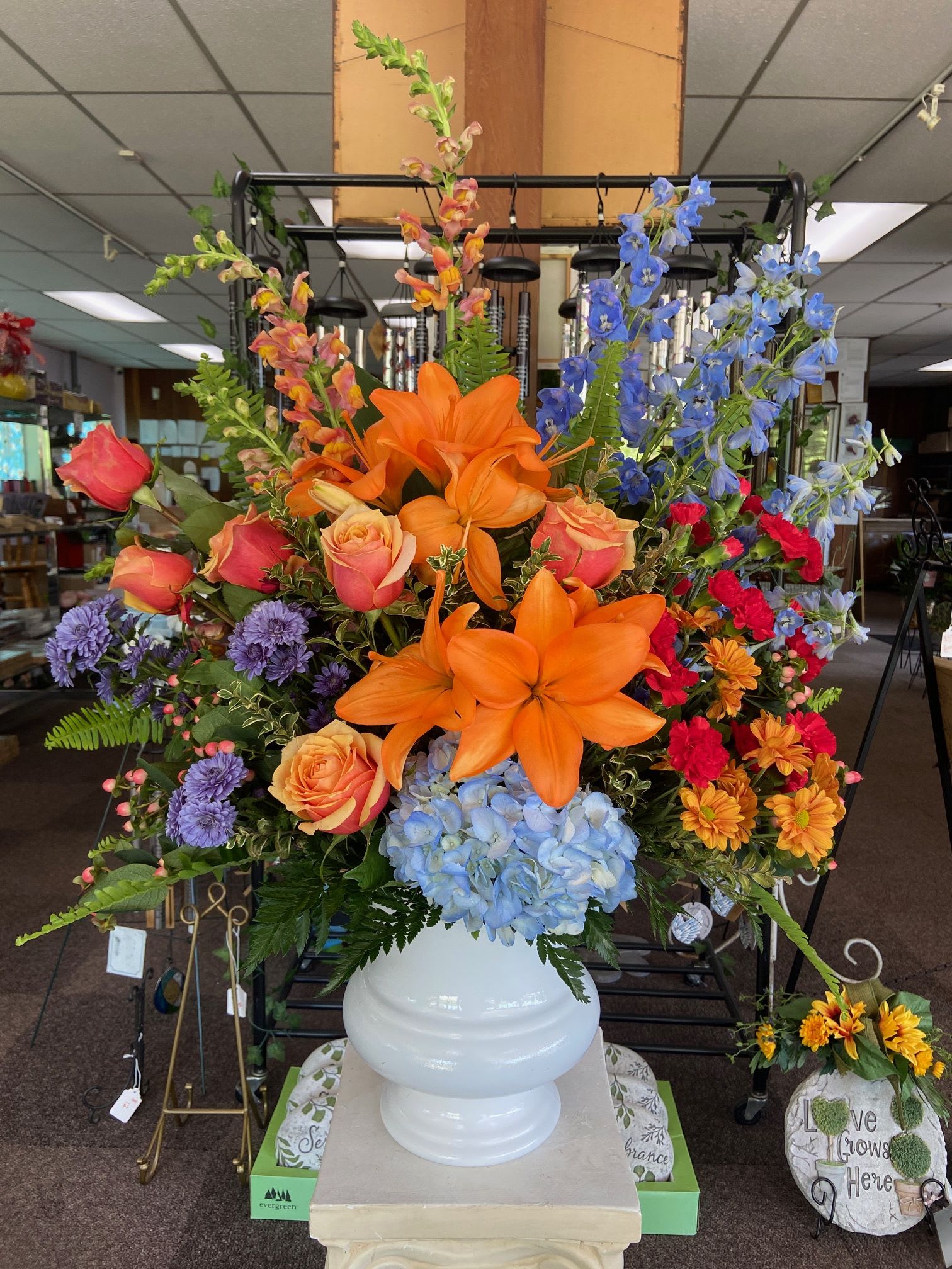 Sunset Funeral Urn - Celebrate a special life with the vibrant colors of the sunset. The Sunset Funeral Urn pairs brilliant blues with vibrant oranges and reds to create a beautiful contrast.