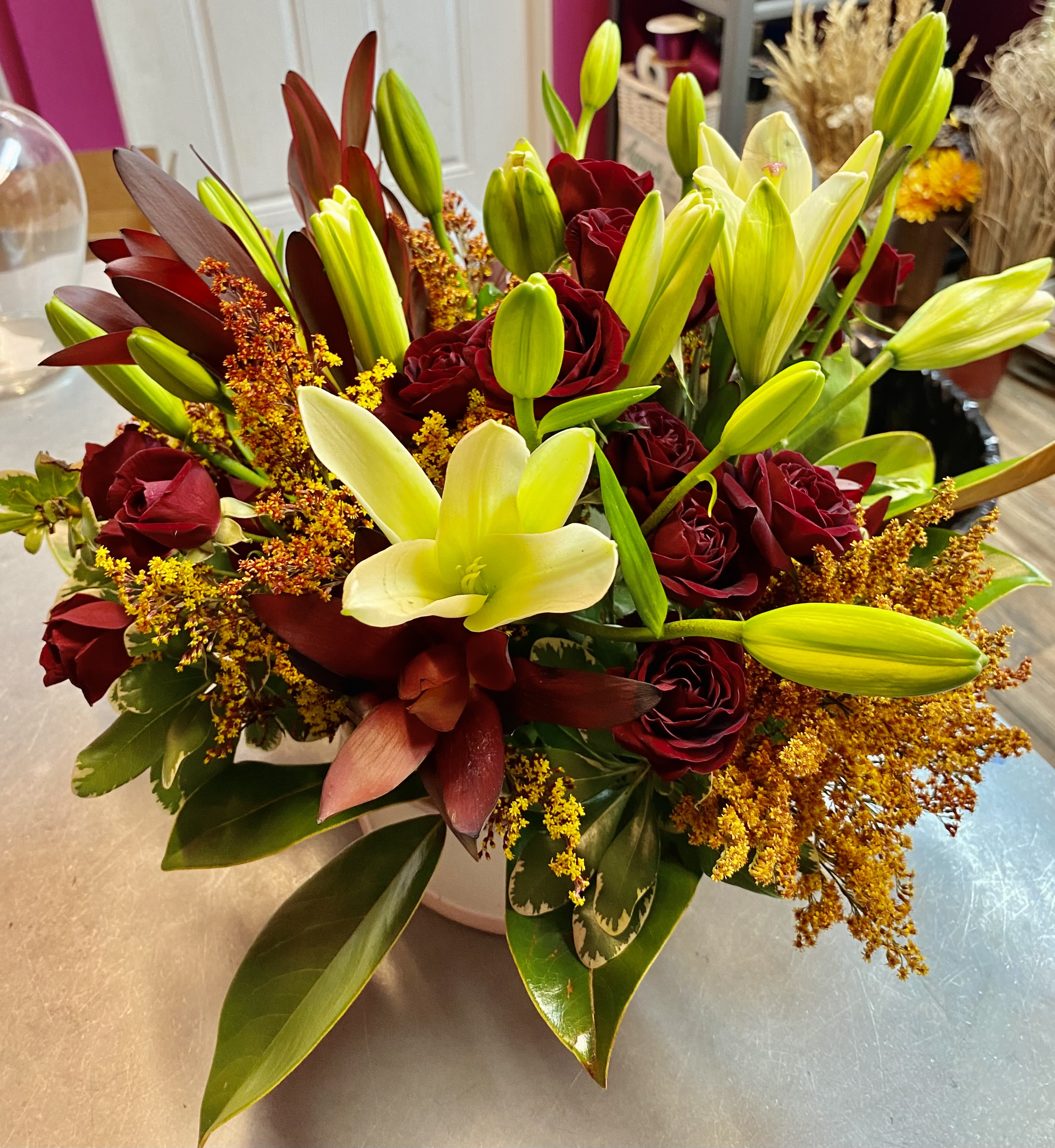 Roses &amp; Lillies Table arrangement - roses, lilies,  and greens!