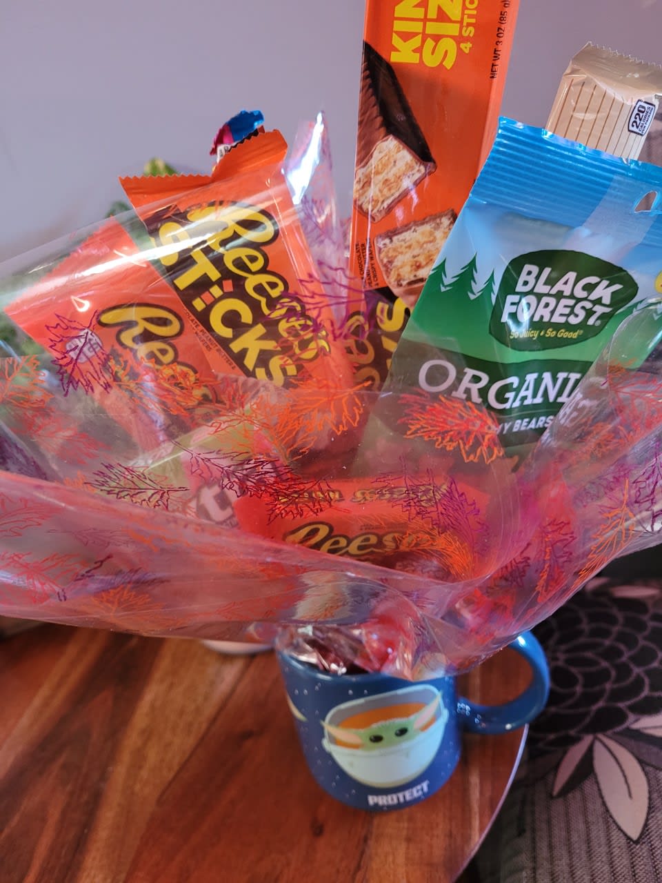 Candy Mug  - A mug of your choosing. Filled with candy, we make seasonal ones all the way to happy birthday candy arrangements. They come with colorful shreds and decor to suit the occasion.