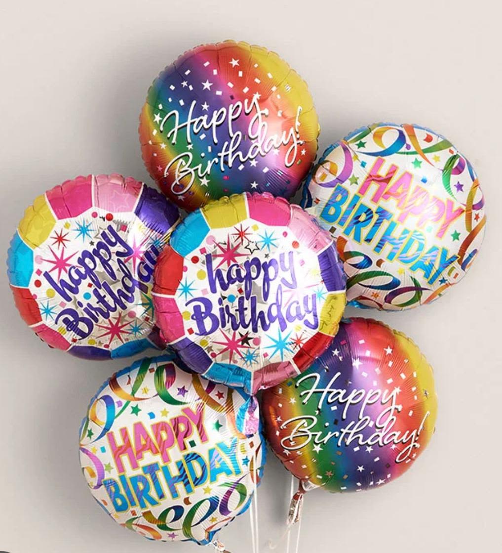 Bundle of five round multicolor Happy Birthday foil balloons on strings