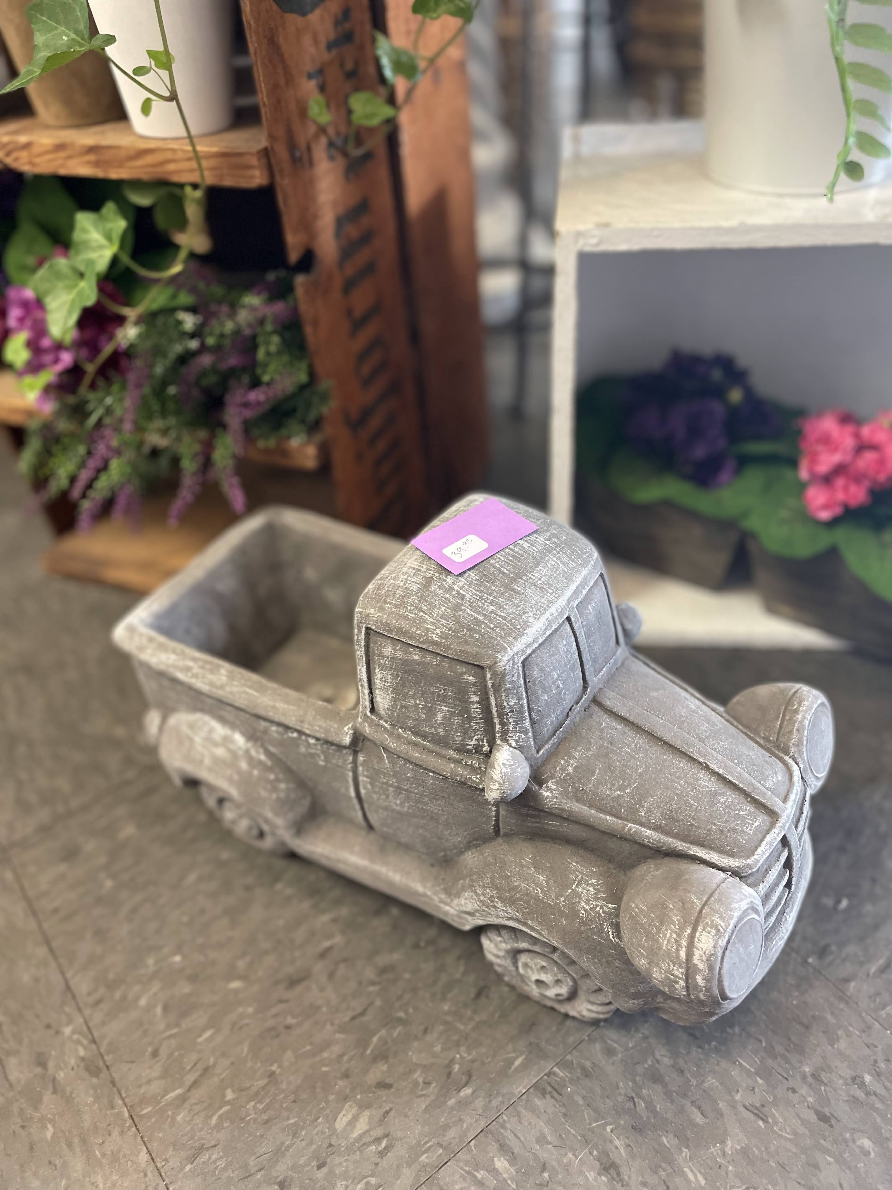Old Truck Stone Planter *See Description* - An old truck stone planter. The price listed includes the price of the stone, along with $50 worth of flowers added to it. If you want a specific style or color of flowers, just write it in the special notes! If not, we will just fill the planter with a nice mixture of seasonal flowers. 