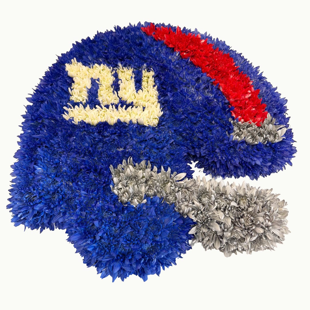 Blue chrysanthemum arrangement shaped like a football helmet with red, white, and silver accents