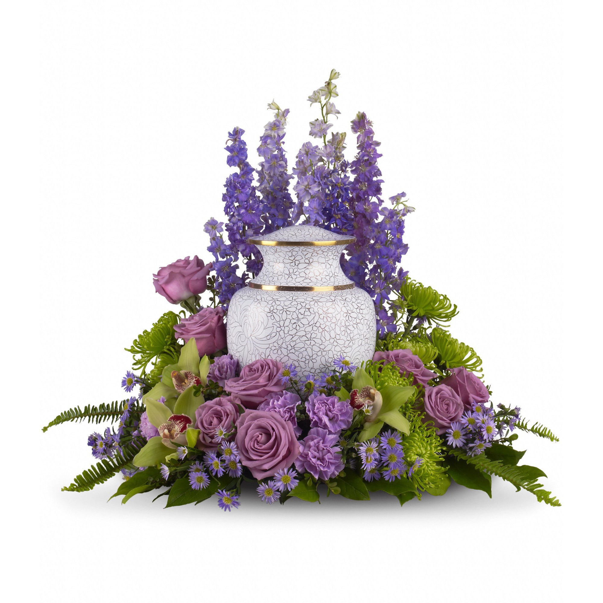 White cremation urn surrounded by purple and green flowers with tall delphinium stems