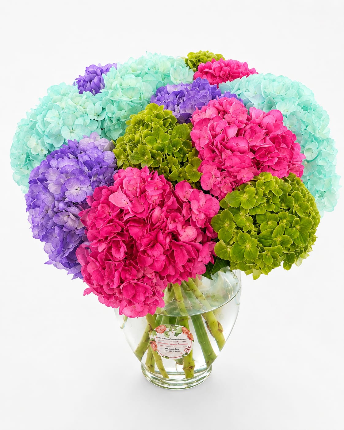 Colorful hydrangea bouquet in a clear glass vase