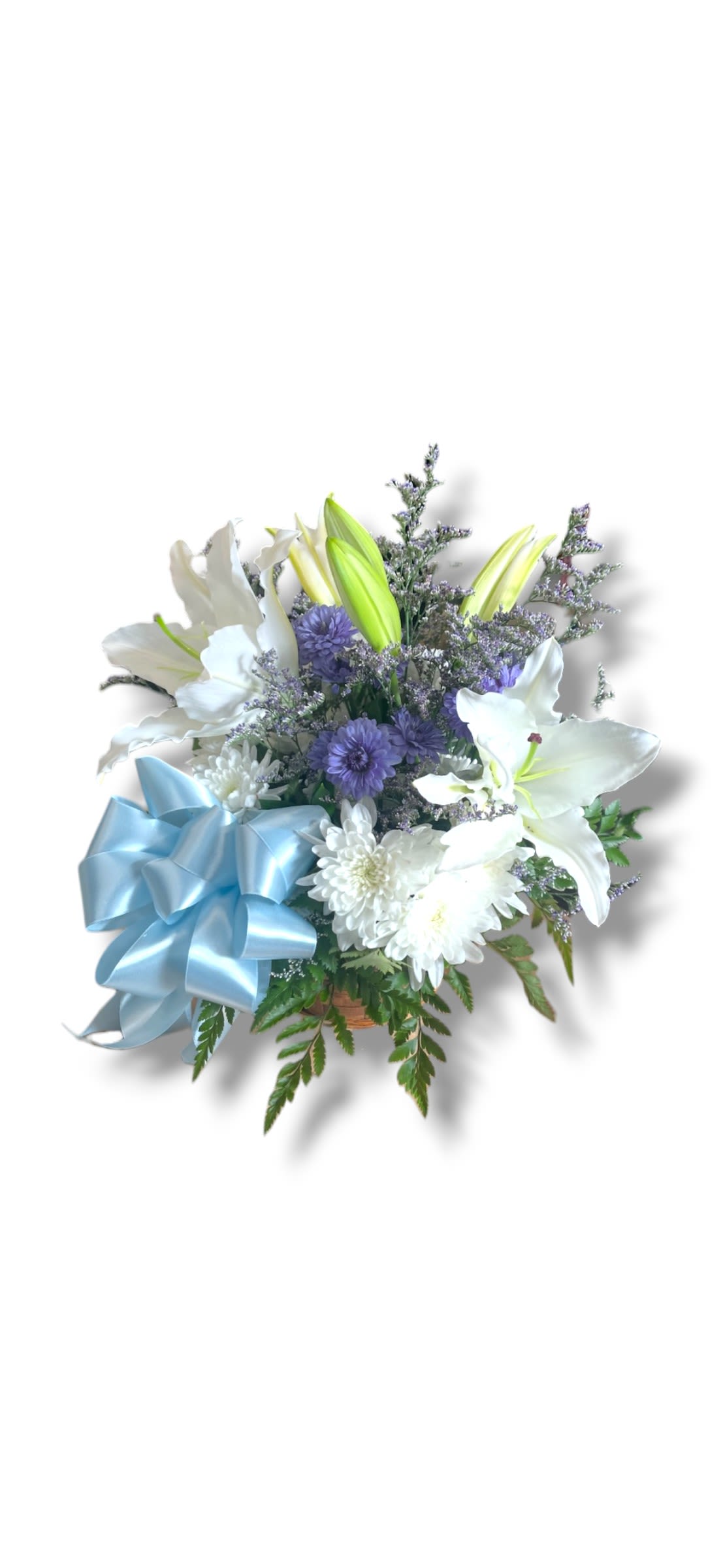 White lilies and purple flowers with a blue ribbon bow