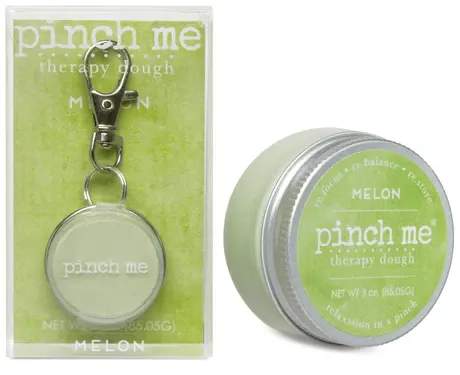 Melon-scented therapy dough tin and keychain in green packaging