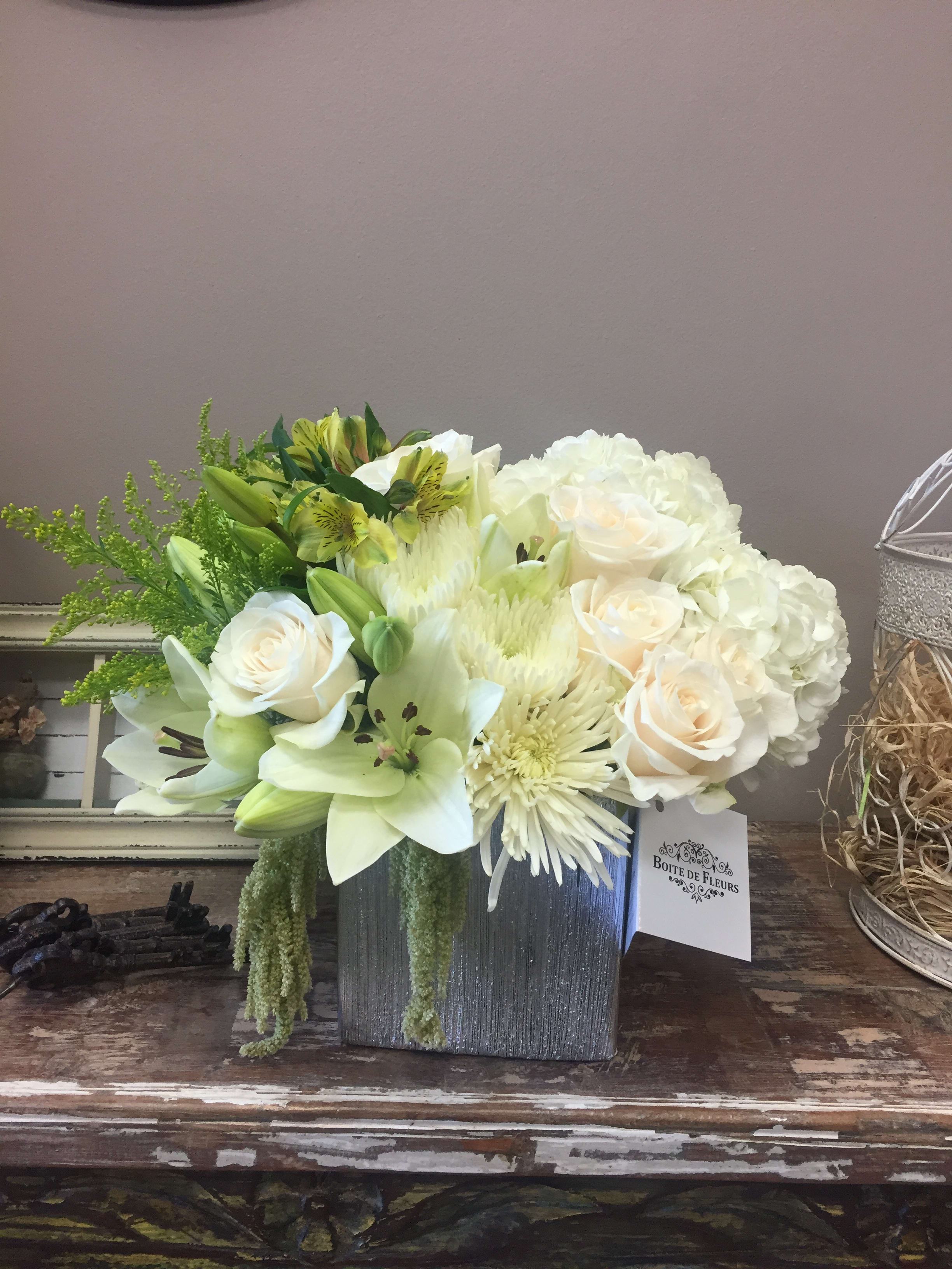 white on silver - greens and whites on a silver vase