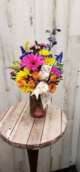 something simple - colored mason jar filled with bright fresh flowers