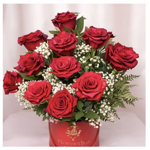 Grand Romance - Grand Romance features twelve premium red roses accented with delicate baby’s breath and lush greenery, elegantly arranged in our signature Florecita by Lixi luxury box. A timeless expression of love designed to make a lasting impression.  **Please note your rose color preference (red, light pink or hot pink) in the notes during checkout**