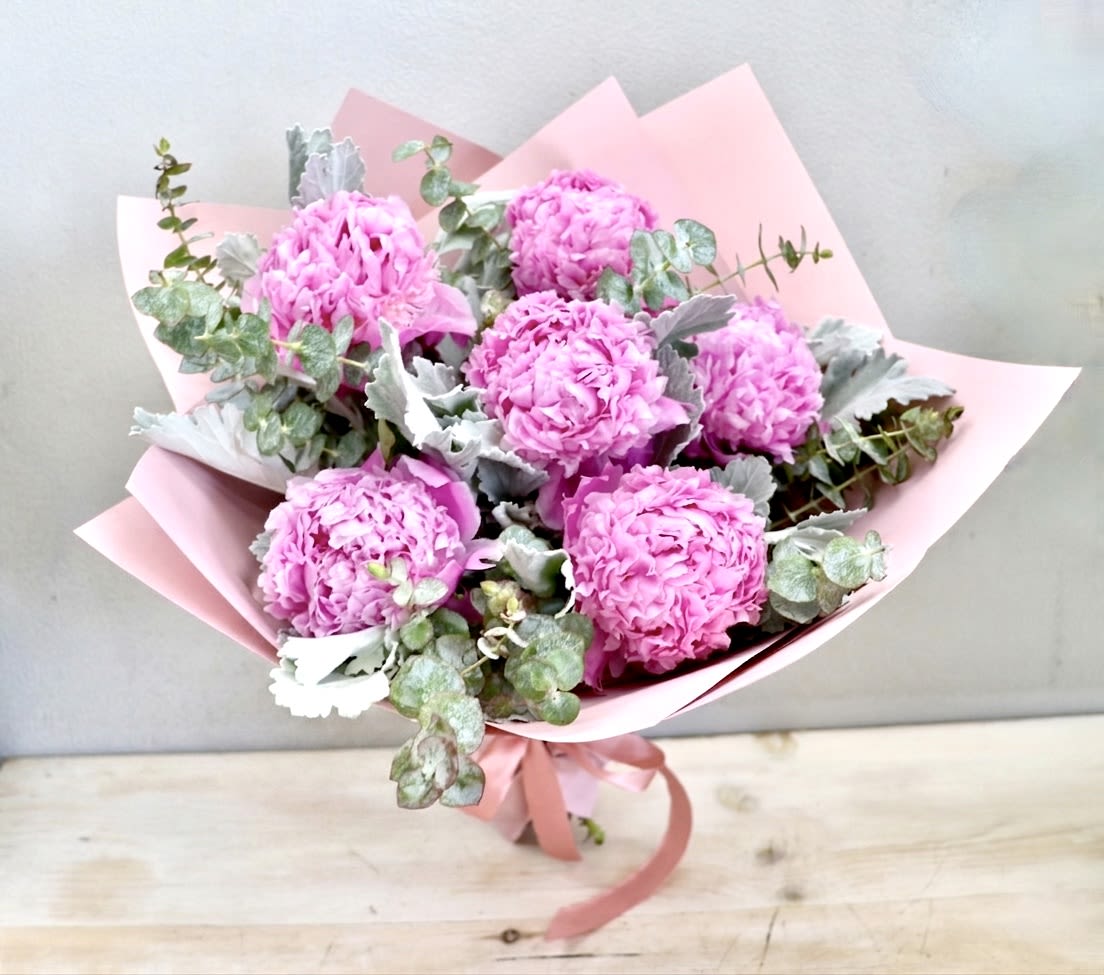 Pink Peony Bouquet - Glendale Flowers - The standard size holds 6 peonies with seasonal greenery. The photo shown is in the DELUXE size with 12 and premium has 18. 