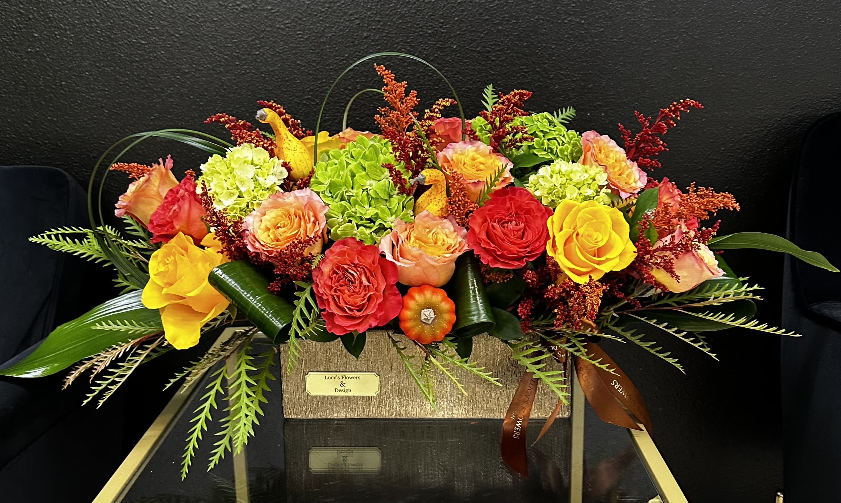 Bright mixed bouquet of roses and hydrangeas in a rectangular box