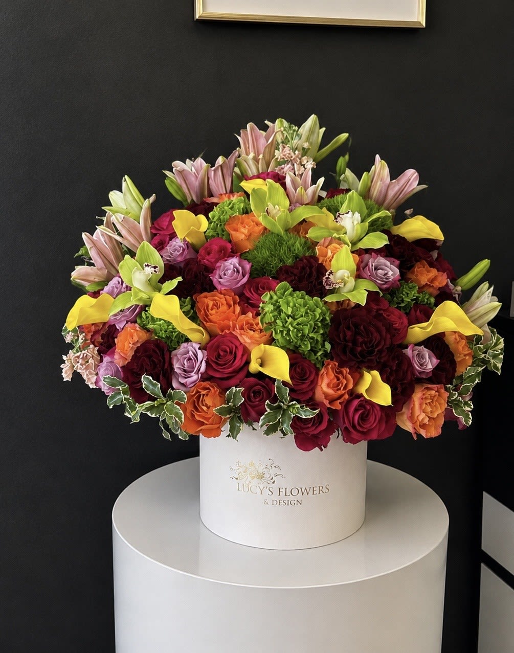 "Vibrant Variety" - Something you can't have too much of-Flowers.....This bright and colorful arrangement is seeking a comfortable home. It is willing to impress, please, and wow your recipient in exchange for a place to stay. Does that sound reasonable to you?  Disclaimer: Photo shown on this arrangement is a Deluxe or Premium version of the arrangement.  