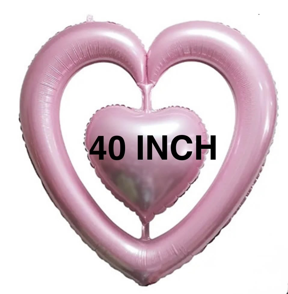 Pink heart-shaped balloons with a smaller heart balloon in front