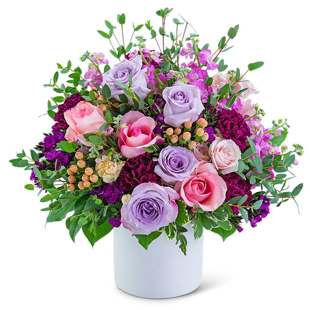Bouquet of pink and lavender roses in a white vase