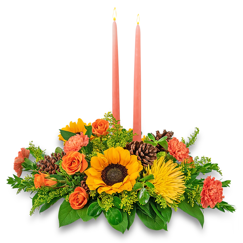Foraging Feast Centerpiece - All the colors of fall are captured in this sunny centerpiece. Our Foraging Feast Centerpiece features sunflowers, roses, spider mums, carnations, solidago, pittosporum, and pinecone accents, all surrounding two tapered candles. A fresh Thanksgiving centerpiece adds a perfect touch of warmth to your holiday tablescape. 