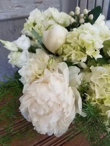 White floral bouquet with hydrangeas and peonies