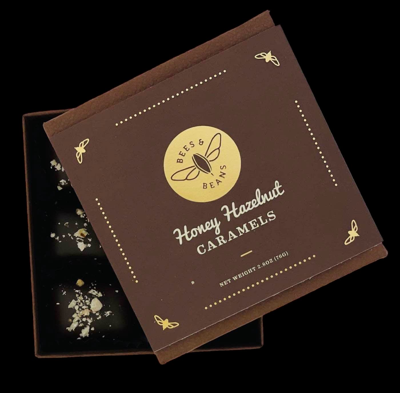 Box of honey hazelnut caramels with a brown lid and black tray