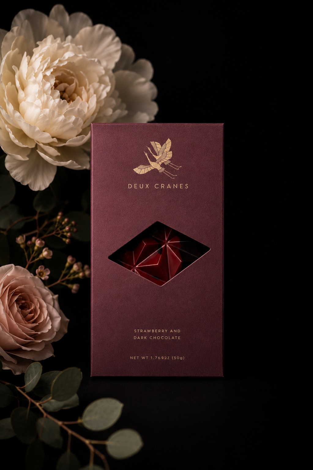 Strawberry &amp; Dark Chocolate - A bold yet romantic classic with a modern twist. Rich, velvety dark chocolate meets the bright, natural sweetness of strawberries for a flavor that’s both indulgent and refreshing. Each bite offers deep cocoa notes balanced by fruity vibrance, creating a chocolate experience that feels luxurious yet playful.  Beautifully packaged and visually striking, this bar makes a standout gift—or a well-deserved treat just for you.  Flavor Notes: Deep dark cocoa • Bright strawberry • Smooth finish Perfect For: Chocolate lovers, romantic gifts, dessert pairings 