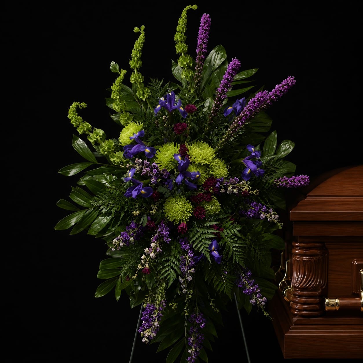 Majestic Honor - Arrangement will be delivered as close to the photo as possible. Substitutions may be made based on seasonal availability while maintaining the overall design, color palette, and value.