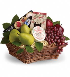 Delicious Delights Basket - It's delicious. It's delightful. It's a foody dream come true. Full of fruit, fun and more, this is a perfect gift for any occasion. Assorted fresh fruit, including apples, grapes and pears, with cheeses,  sausage and crackers, beautifully wrapped up in a wicker basket and ready to be enjoyed.  Please note: Items contained within may vary due to seasonal availability.
