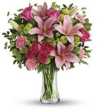 Dressed to Impress Bouquet  - This blissfully bright bouquet features hot pink roses, hot pink spray roses, pink Asiatic lilies, pink carnations, green button chrysanthemums, bupleurum, huckleberry and lemon leaf.  Professionally arranged in a clear glass gathering vase and available for same day delivery to most Denver locations by Floral Expressions, your Favorite Florist!   