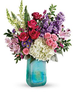 Iridescent Beauty Bouquet  - White hydrangea, hot pink roses, pink spray roses, light pink alstroemeria, white snapdragons, lavender stock, lavender matsumoto asters and raspberry sinuata statice are artistically designed with dusty miller, leatherleaf fern, sword fern, and huckleberry. Delivered in an iridescent, shimmering art glass treasure vase and available for same day delivery to Washington Park, Platt Park, University Hills and most Denver neighborhoods.