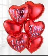 Cluster of red heart-shaped balloons with "I Love You" text