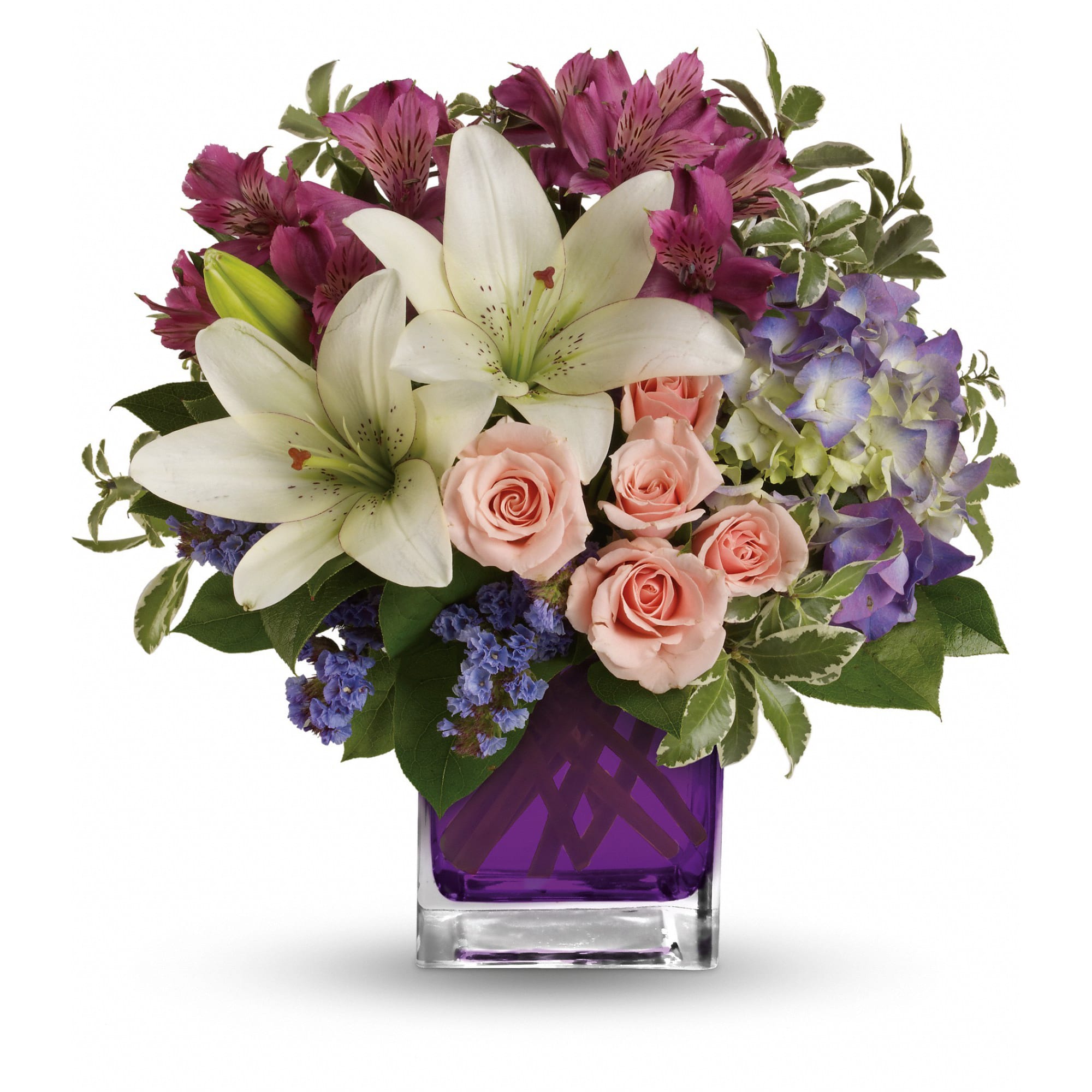 Garden Romance - Hello, gorgeous! This lovely bouquet includes purple hydrangea, light pink spray roses and white asiatic lilies arranged in our vibrant violet glass cube.  
