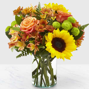 Autumn Splendor Bouquet - Sunflowers, roses, alstromeria, and mums make this bouquet a lively addition to your autumn table. It's sure to make your home feel warm and sunny. Vase style may vary. 