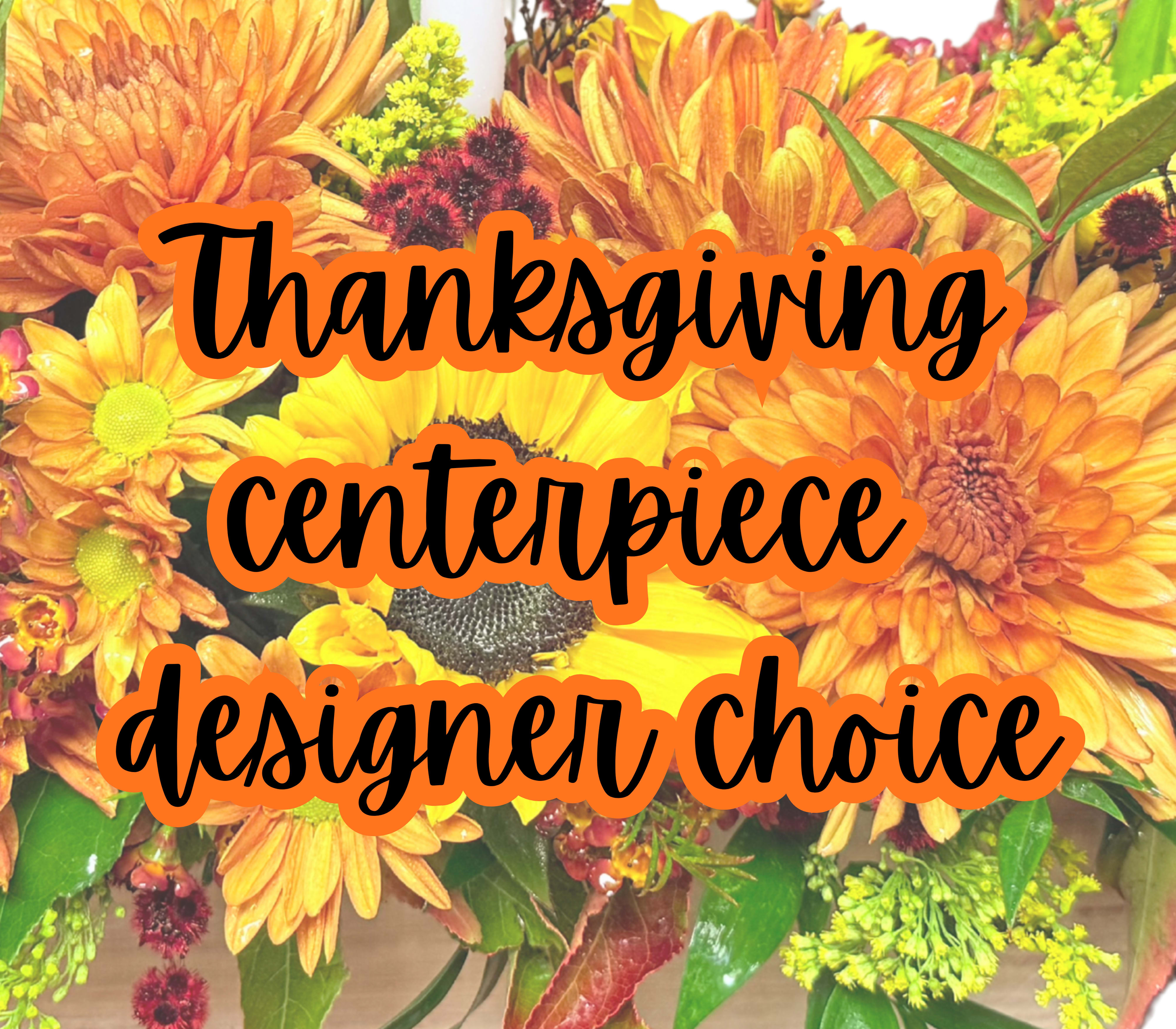 Thanksgiving centerpiece designer choice  -  Thanksgiving Centerpiece – Designer’s Choice  Let our floral artists craft a one-of-a-kind centerpiece that captures the spirit of the season. Each arrangement is thoughtfully designed with fresh, autumn-inspired blooms—think sunflowers, mums, roses, berries, and seasonal foliage—accented with warm tones and festive textures. Whether rustic or refined, candlelit or lush with greenery, your centerpiece will be a radiant reflection of gratitude, celebration, and harvest beauty. Perfect for holiday tables, heartfelt gifts, or welcoming décor.