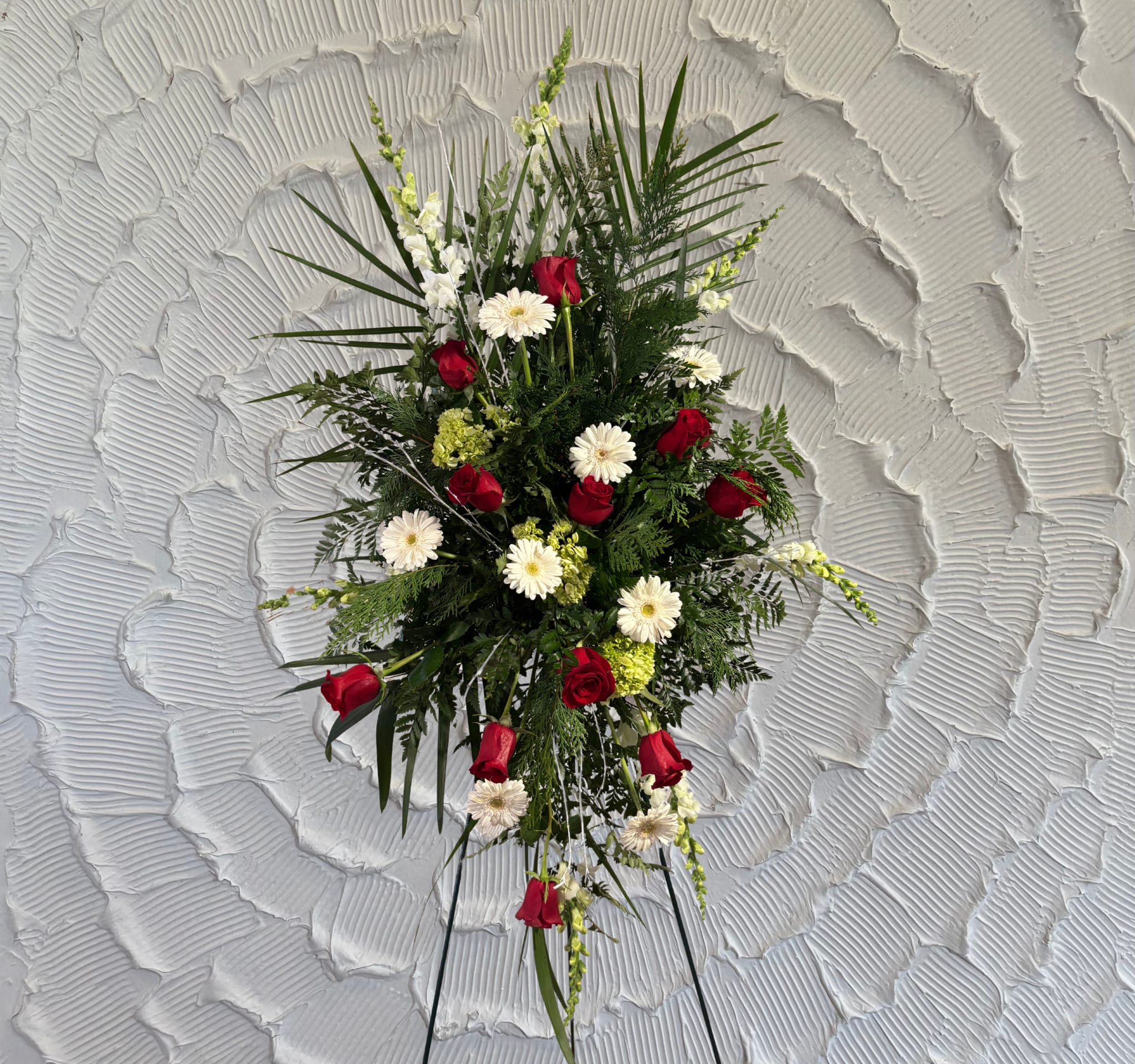 Standing floral spray with red roses and white daisies
